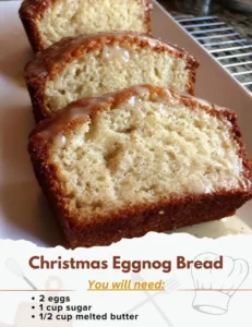 A loaf of Christmas Eggnog Bread garnished with cinnamon and nutmeg.