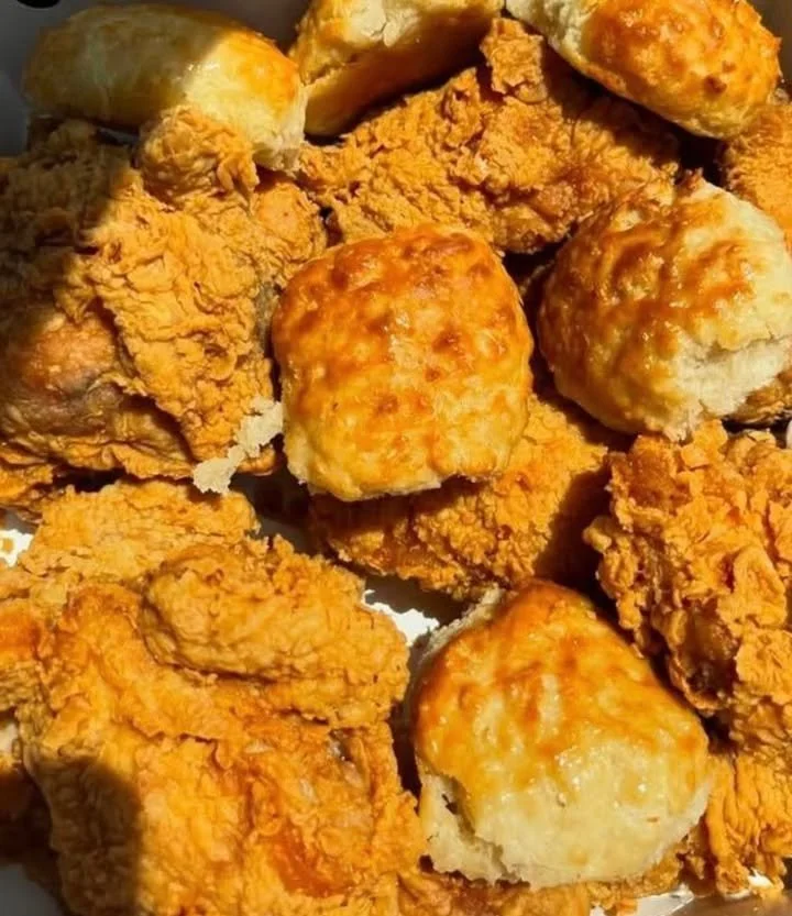 Freshly baked Church's Biscuits served warm with golden brown top.
