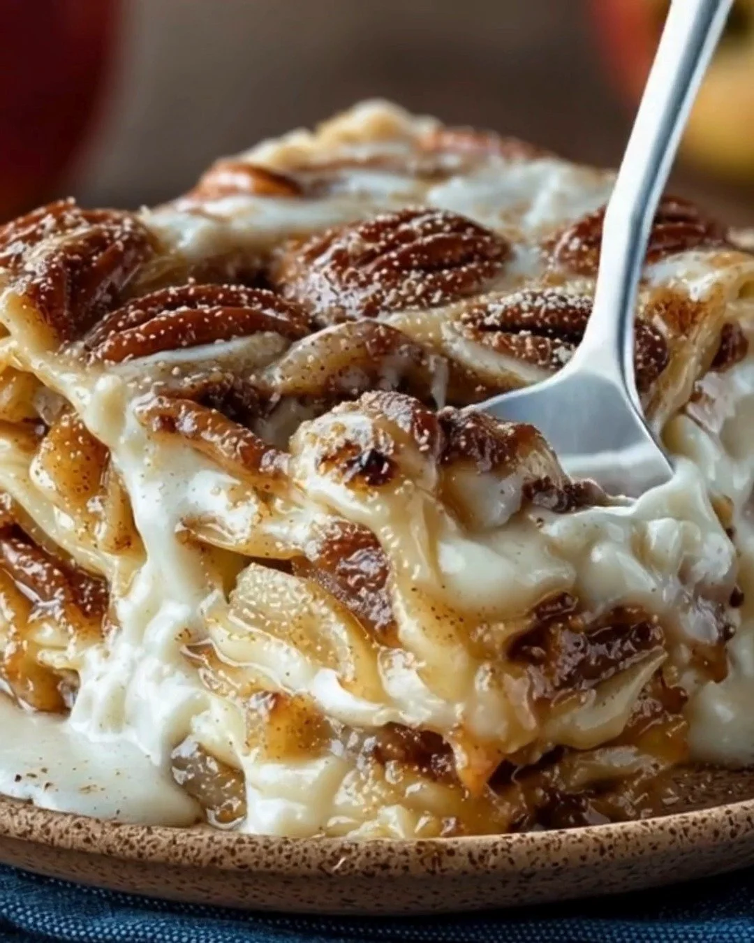 A delicious Cinnamon Roll Apple Lasagna with spiced apples and cream cheese