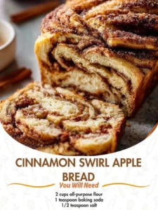 Freshly baked cinnamon swirl apple bread with cinnamon and apple slices