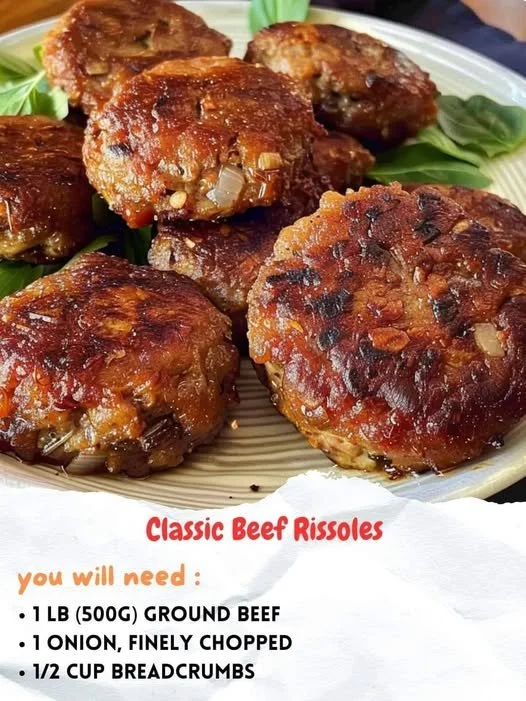 Delicious classic beef rissoles served on a plate with herbs and spices