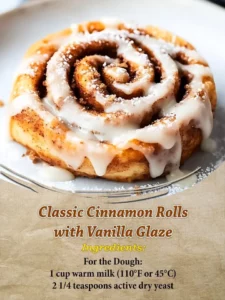 Freshly baked classic cinnamon rolls topped with vanilla glaze