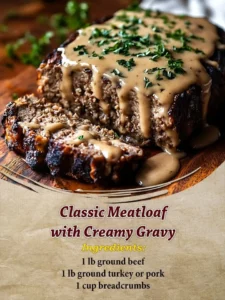 Classic meatloaf with creamy gravy served on a plate