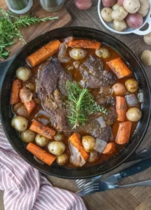 Classic pot roast with tender beef and vegetables served for a hearty meal