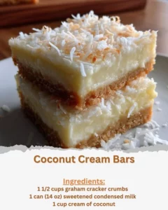 Delicious homemade Coconut Cream Bars with coconut topping and creamy layers