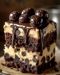 Decadent Cookie Dough Brownie Cake topped with cookie dough