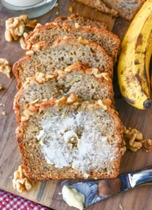 Delicious slice of copycat Starbucks banana bread on a wooden table