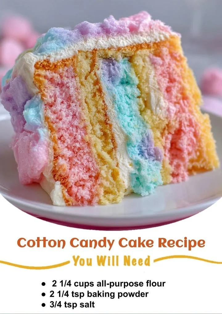 Delicious Cotton Candy Cake decorated with fluffy cotton candy and colorful sprinkles.