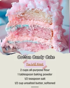 Delicious Cotton Candy Cake topped with colorful cotton candy and sprinkles.