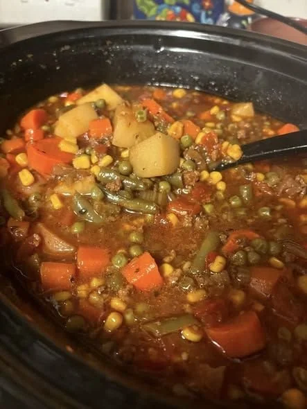 A bowl of delicious Cowboy Soup with beans, corn, and spices.