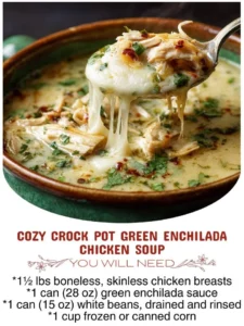 Bowl of cozy crock pot green enchilada chicken soup topped with cilantro and lime