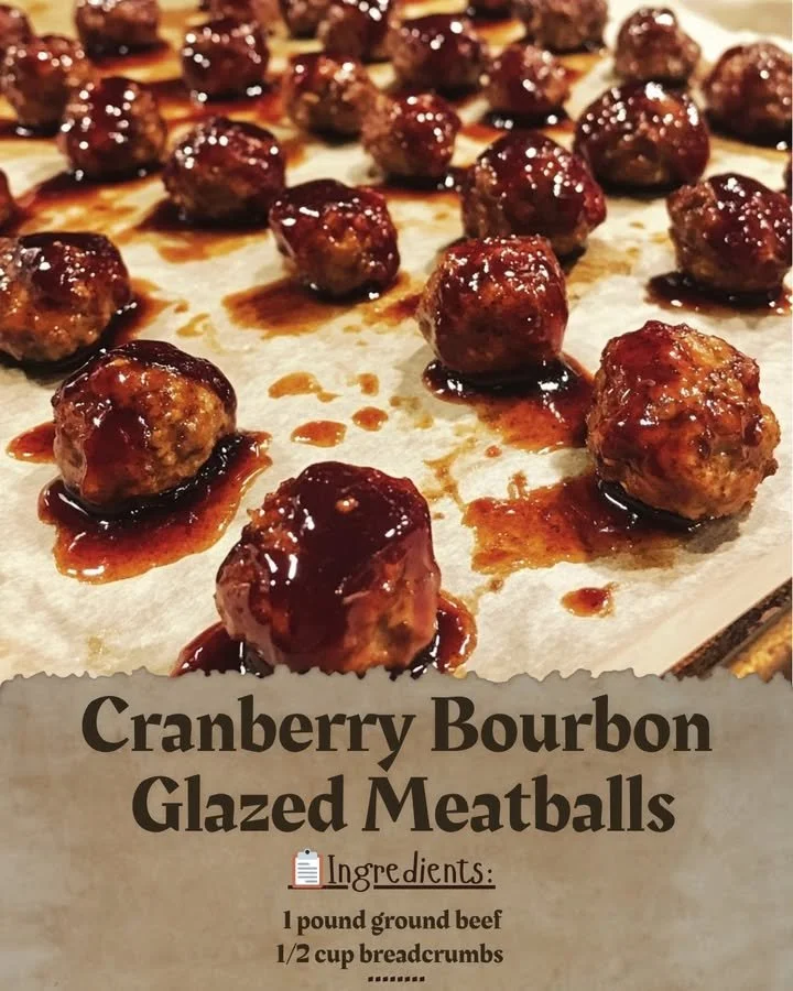 Cranberry Bourbon Glazed Meatballs garnished and served on a platter