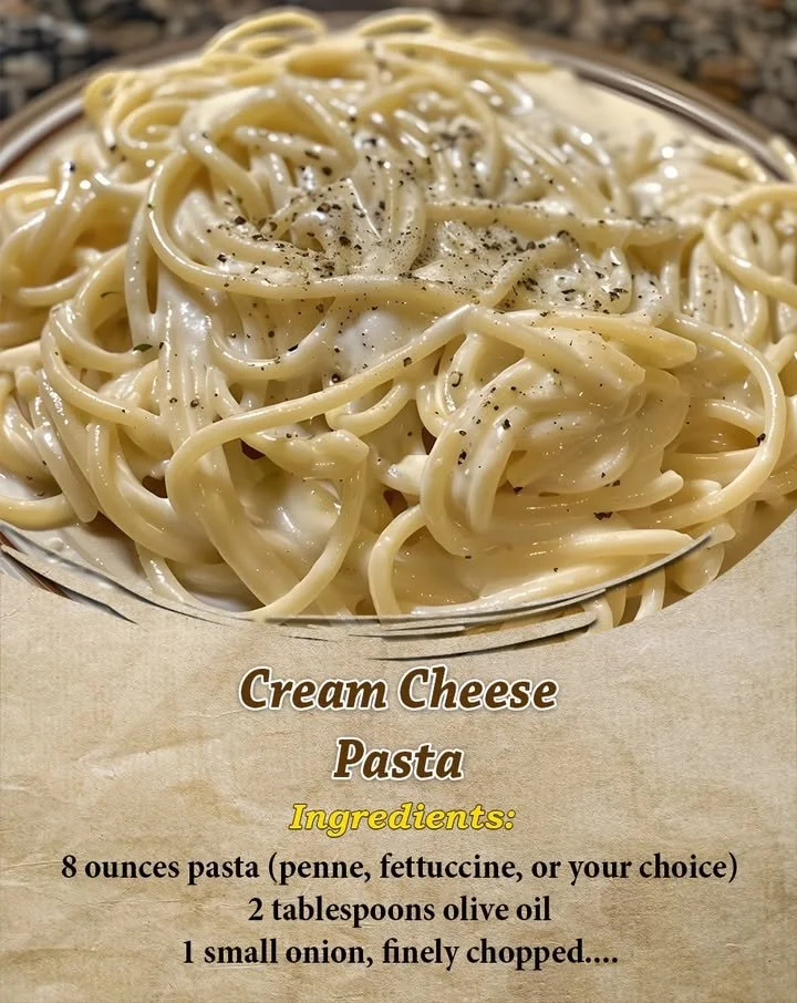 Delicious Cream Cheese Pasta garnished with herbs in a white bowl