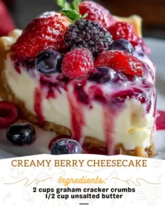 Slice of creamy berry cheesecake topped with fresh berries