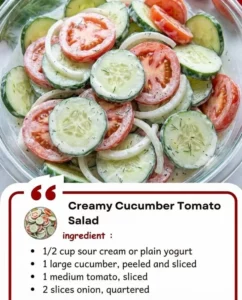 Delicious creamy cucumber tomato salad served in a bowl.