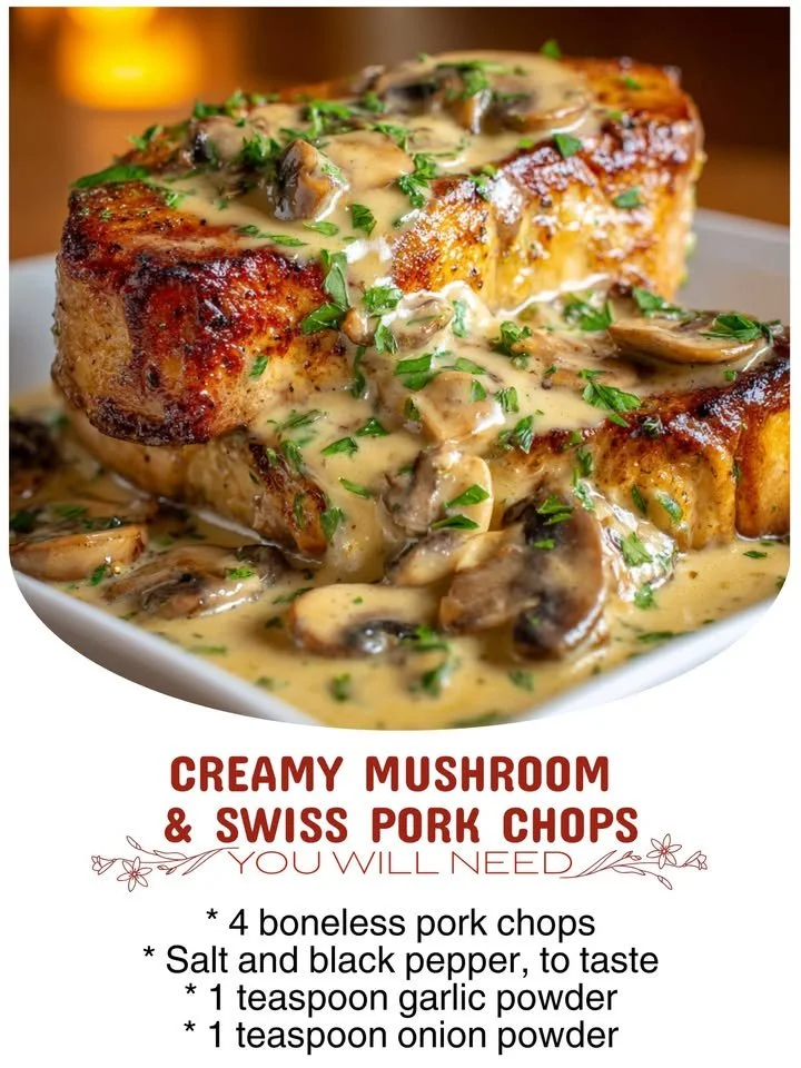 Creamy mushroom pork chops with Swiss cheese sauce on a plate.