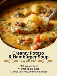 Creamy potato hamburger soup served in a bowl with fresh herbs