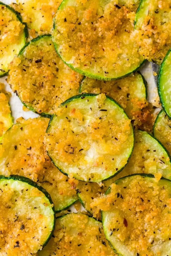 Crispy baked zucchini sticks served on a plate