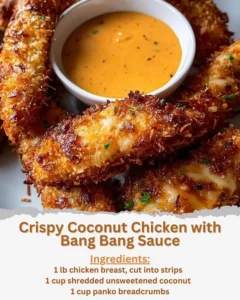 Crispy coconut chicken served with bang bang sauce on a plate.