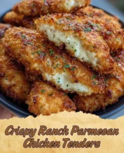 Plate of crispy ranch parmesan chicken tenders with dipping sauce.