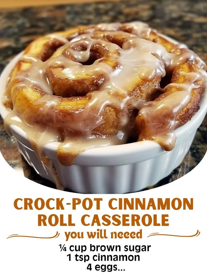 Deliciously baked Crock-Pot cinnamon roll casserole topped with icing