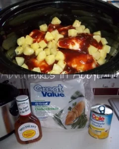 Crock Pot Hawaiian BBQ Chicken with pineapple and BBQ sauce served on a plate