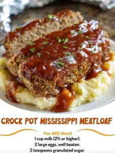 Delicious Crock Pot Mississippi Meatloaf ready to serve with a side dish.