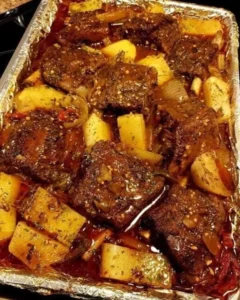 Delicious crockpot beef short ribs served with a side of vegetables.