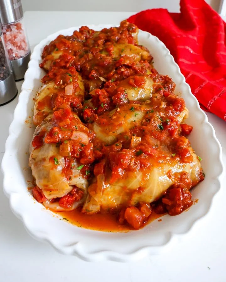 Delicious Crockpot Cabbage Rolls ready to serve with a flavorful tomato sauce.
