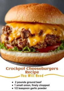 Delicious Crockpot Cheeseburgers served on a plate with toppings.