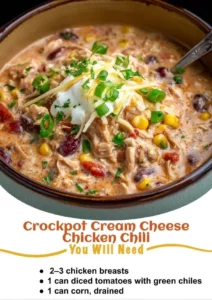 A bowl of Crockpot cream cheese chicken chili topped with fresh herbs
