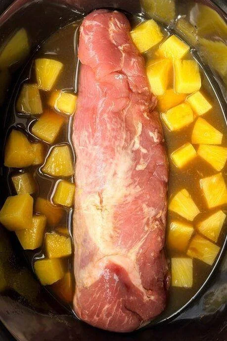 Crockpot Hawaiian Pineapple Pork dish with pineapple chunks and spices