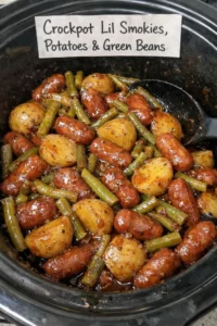 Crockpot Lil Smokies with potatoes and green beans in a slow cooker