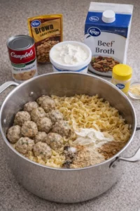 Crockpot Swedish Meatball Pasta served in a bowl with fresh parsley garnish.