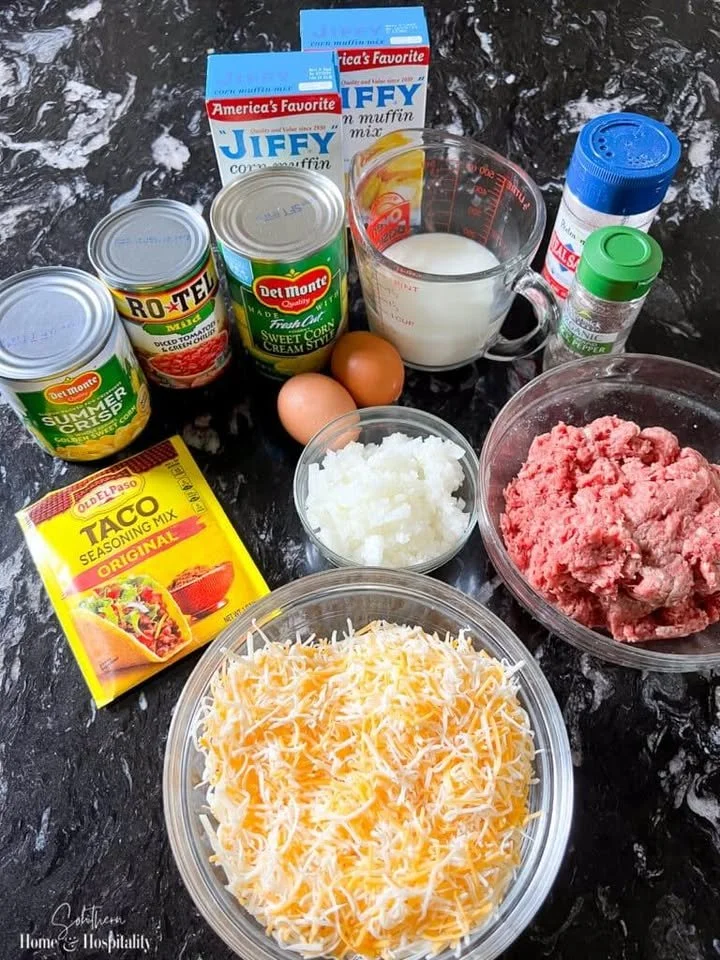 Delicious Crockpot Taco Casserole topped with cheese and fresh ingredients