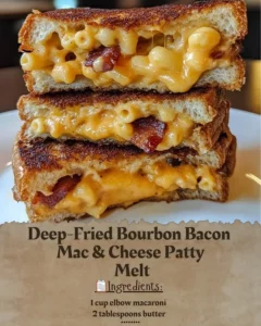 Deep-Fried Bourbon Bacon Mac & Cheese Patty Melt served on a plate
