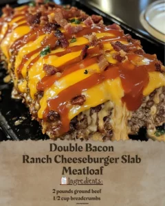Double Bacon Ranch Cheeseburger Meatloaf topped with crispy bacon and ranch sauce