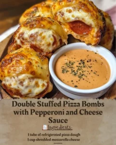 Double stuffed pizza bombs with pepperoni and cheese sauce on a plate