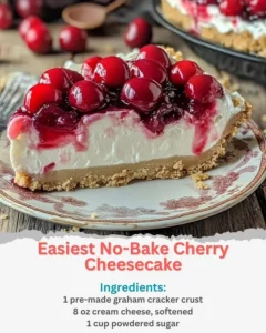 Easiest no-bake cherry cheesecake topped with fresh cherries and whipped cream