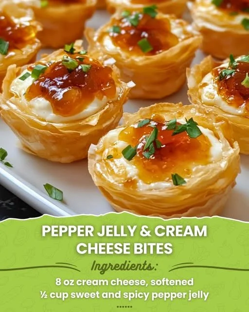 Delicious pepper jelly bites with cream cheese served on a platter
