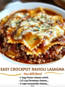 Delicious Easy Crockpot Ravioli Lasagna served in a bowl with cheese and herbs.