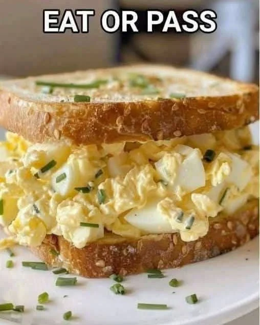 Delicious homemade egg salad sandwich with fresh ingredients