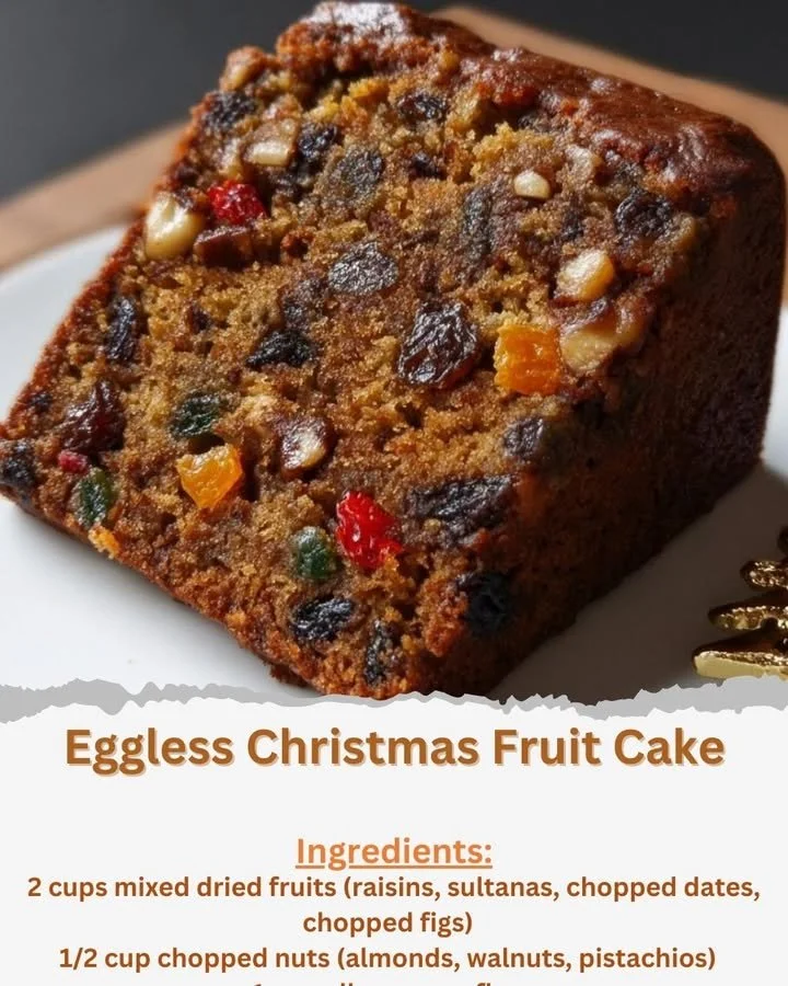 Delicious eggless Christmas fruit cake decorated with festive fruits and nuts.