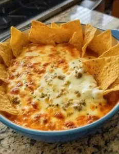 A variety of famous dips served in bowls on a table at a gathering