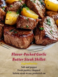 Garlic butter steak skillet with sizzling steak and melted garlic butter