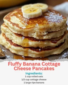 Fluffy banana pancakes topped with syrup and fresh fruit
