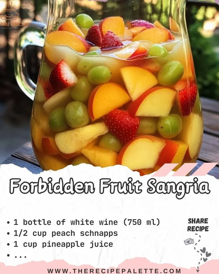 A glass of Forbidden Fruit Sangria with vibrant fruits and wine