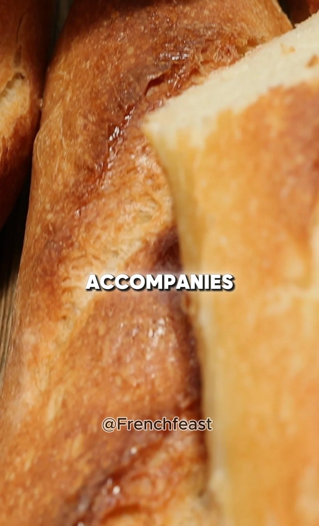 Freshly baked French baguette on a wooden table