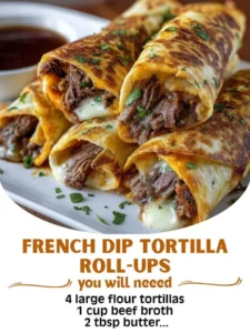 French Dip Tortilla Roll-Ups served on a plate with dipping sauce