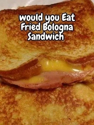 Delicious Fried Bologna Sandwich topped with mustard and served on toasted bread